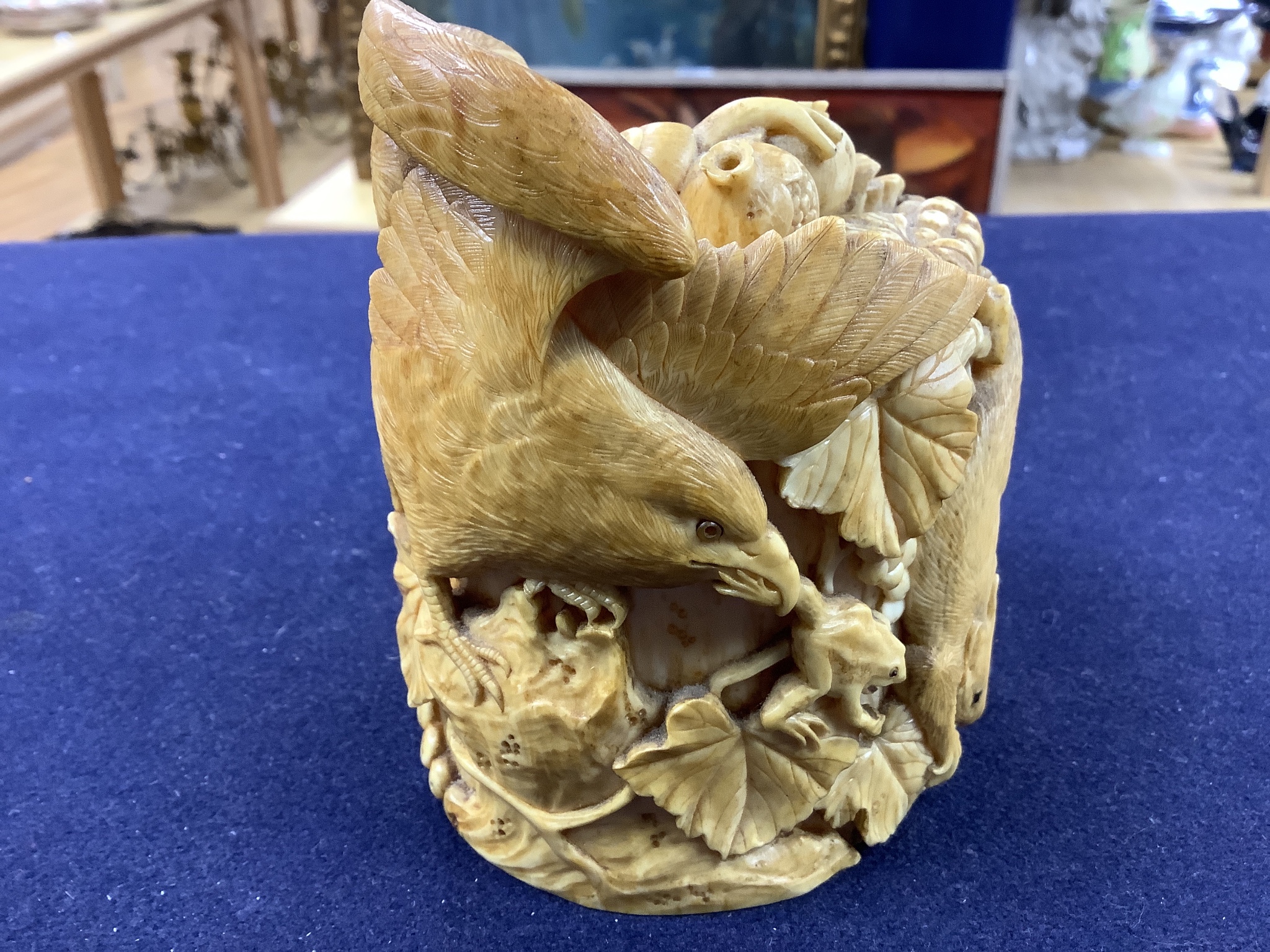 A Japanese ivory box carved with an eagle, frog and squirrels, Meijii period